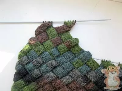 Vest for a boy of 7 years with knitting with photos and video