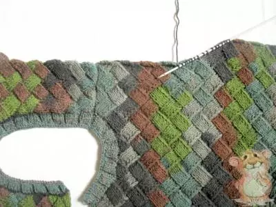 Vest for a boy of 7 years with knitting with photos and video
