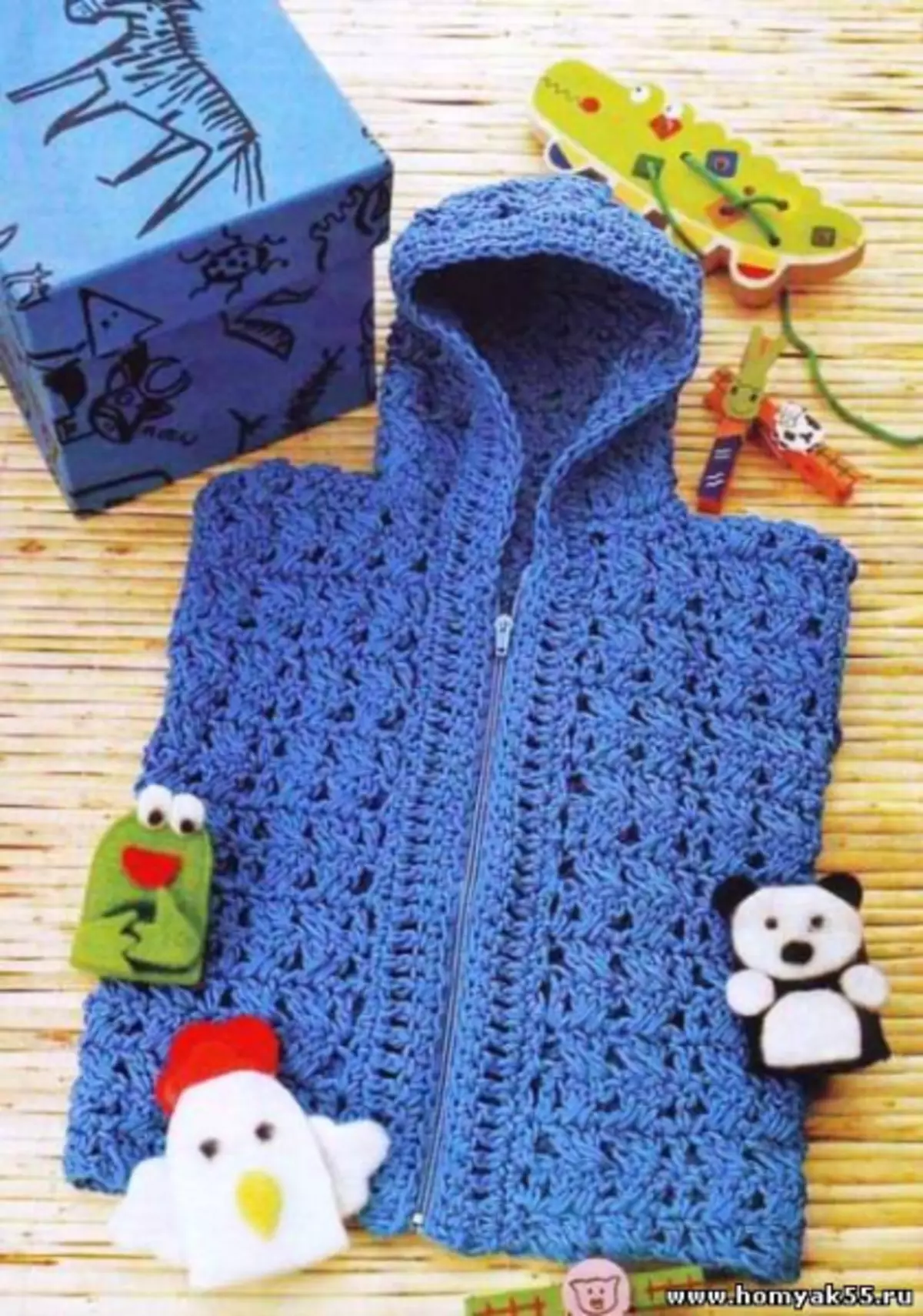 Vest for a boy of 7 years with knitting with photos and video