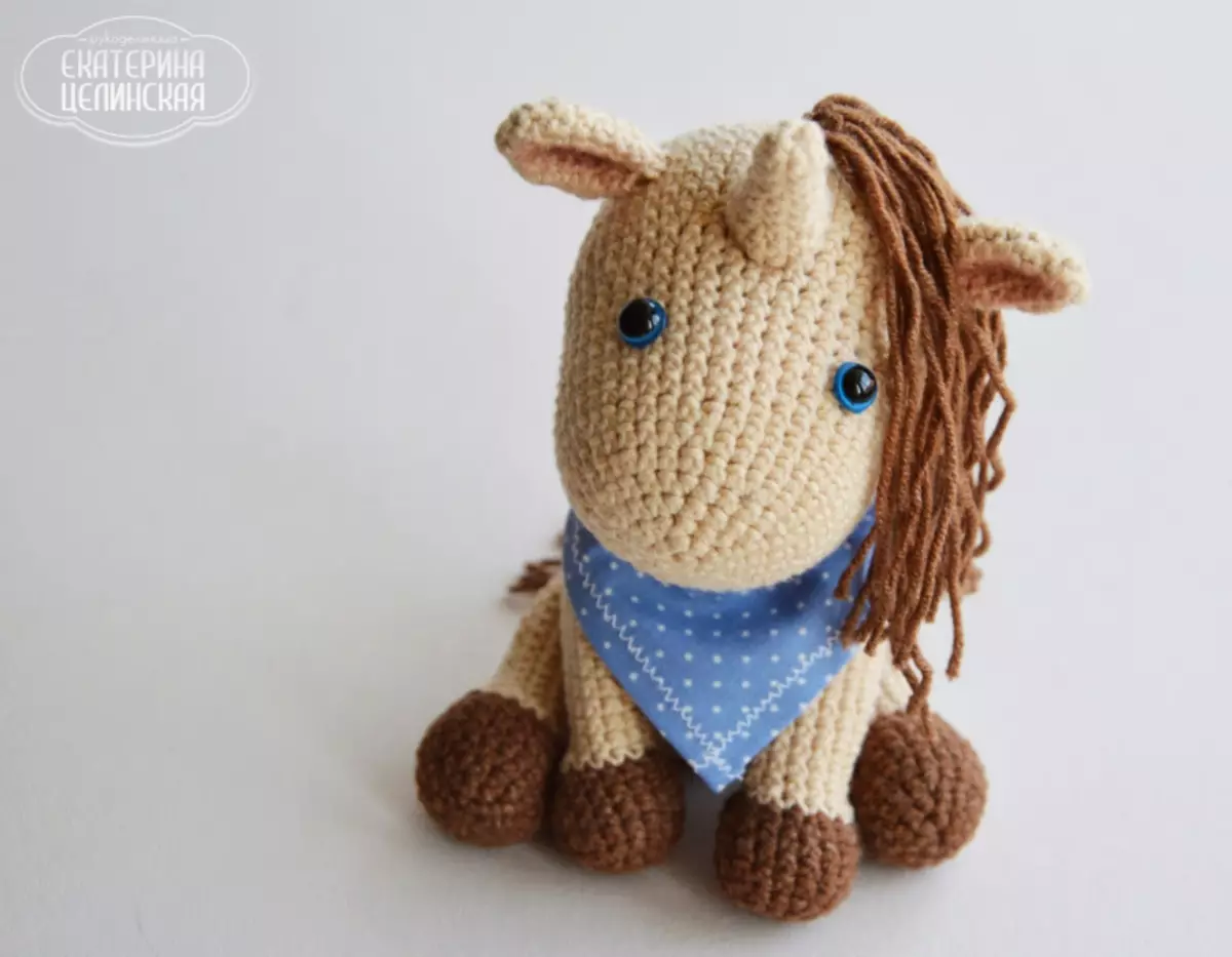 Crochet Horse: shēma un Āfrikas zīmējuma apraksts no motīviem