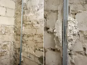 Mur de briques de plâtre avec vos mains