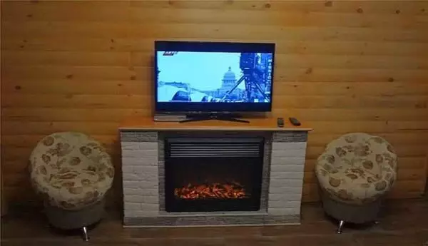 Pandekorasyon false fireplace gawin ito sa iyong sarili