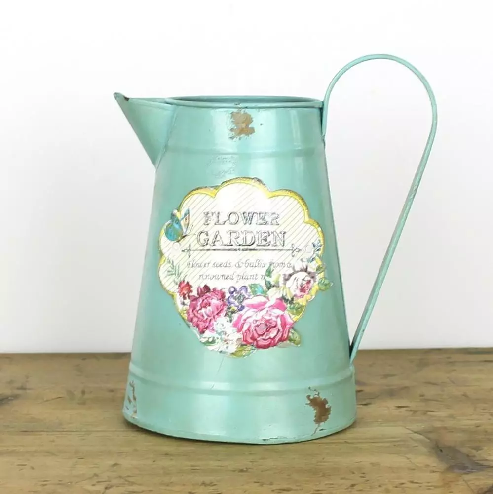 Watering can with derm in decoupage technique
