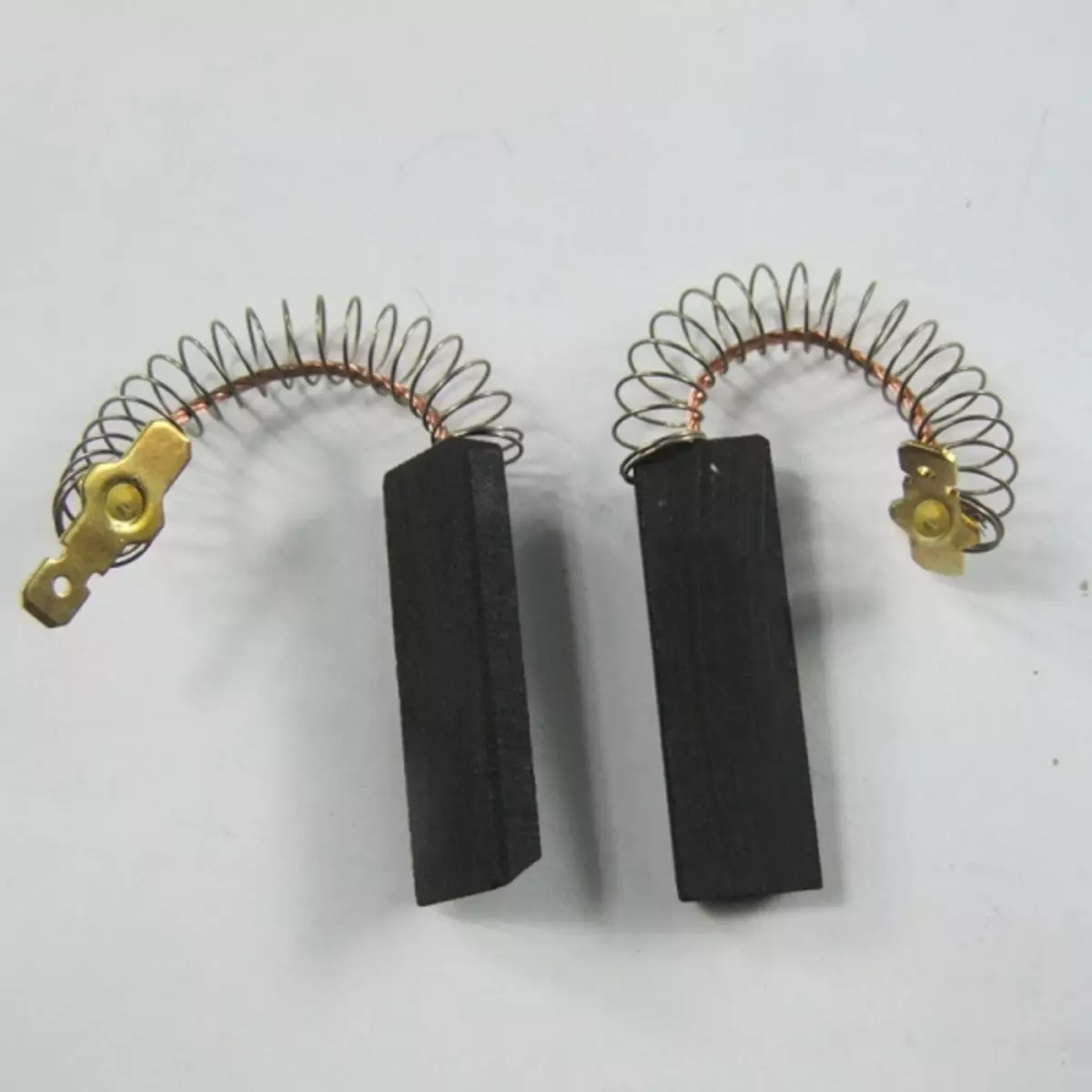 Brushes for electric motors of washing machines