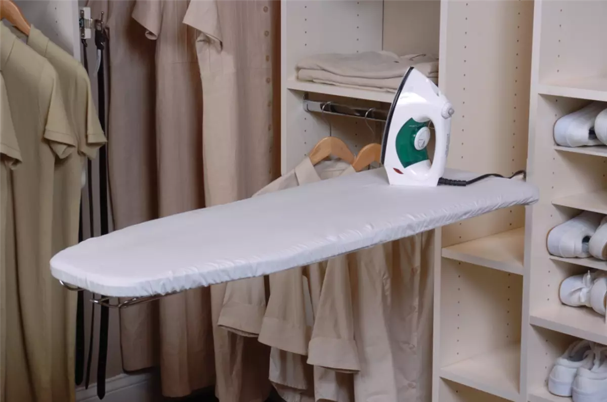 Built-in ironing board in the dressing room