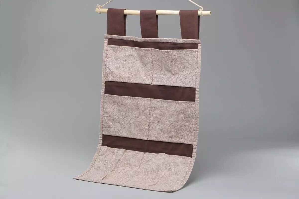 Fabric Pockets: Excellent Little Bedroom Organizer.