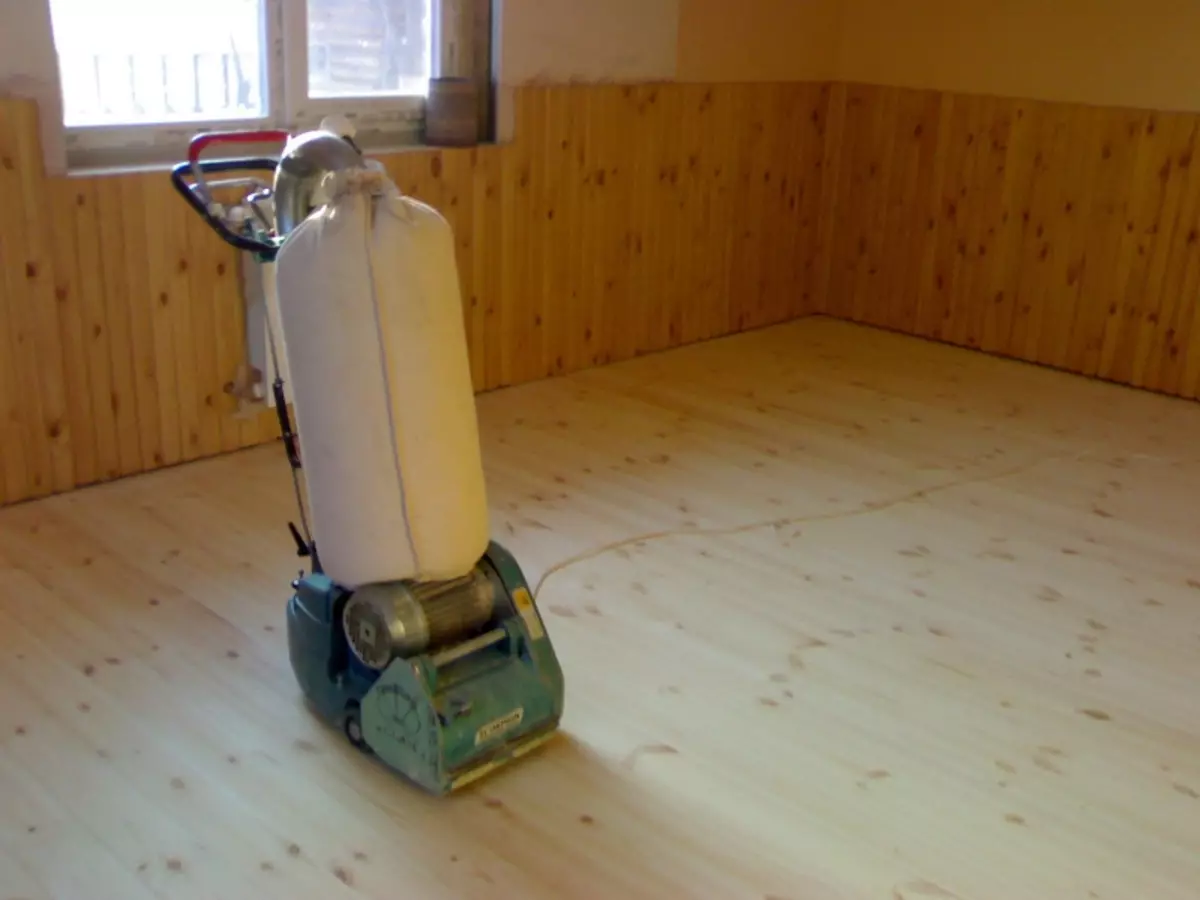 Moledor de piso: tabla de madera de gran tamaño, cómo pulir sus propias manos, video manualmente, máquina de molienda
