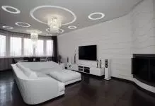 Must parkett: pimedas korrusel interjööris blond seinad, köögis laminaat ja magamistoas disain, pruun ja valge mööbel