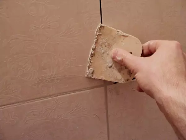 Cracked the tile on the wall in the bathroom - what to do and how to change
