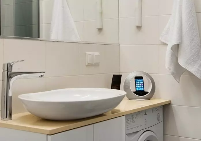 Washing Machine under the tabletop in the bathroom