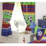 Daddy son football player!: Football themes in the interior of the room