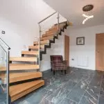 Funktioner i korridoren design med en trappa och möjliga alternativ för arrangemang | +70 foto