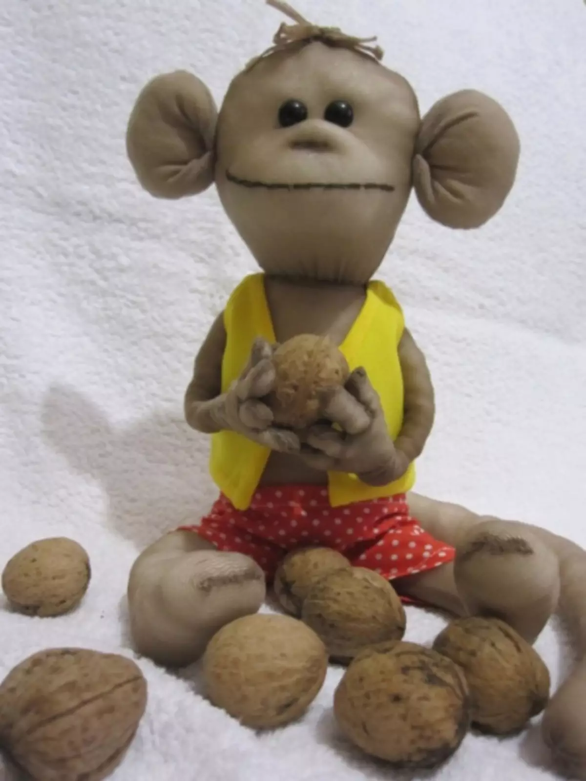 Monkey lati kapron: itọnisọna igbesẹ-ni-igbesẹ pẹlu awọn fọto ati fidio