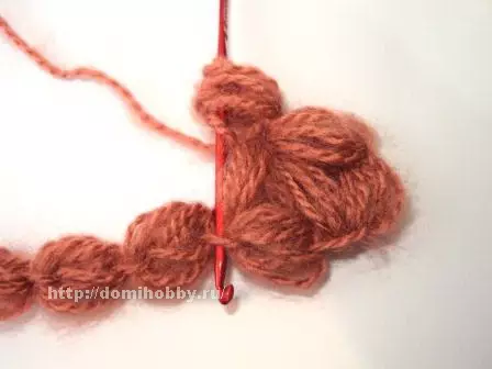 Lush crochet ginshiƙai a cikin da'irar: makirci tare da bidiyo