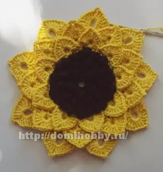 Sunflower napkin crochet: Scheme sy famaritana miaraka amin'ny horonantsary