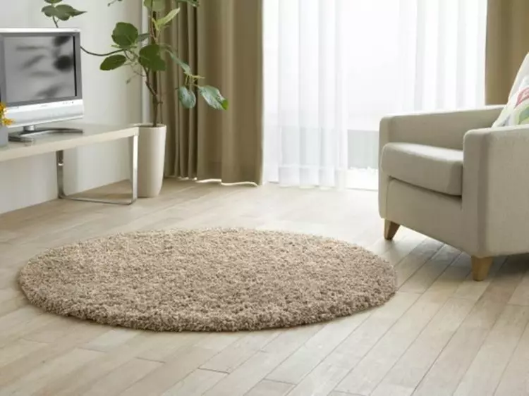 Oval ug round nga mga karpet sa interior (30 nga litrato)