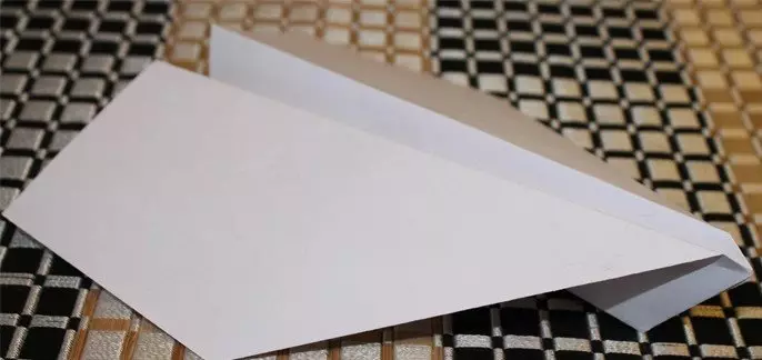 How to make a paper plane - instruction, photo