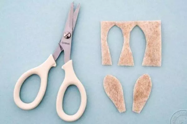 Jak zrobić królik z rękami z wątków i z tkaniny