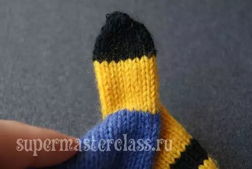 Migon mittens avec aiguilles à tricoter: classe de maître avec un schéma et une description