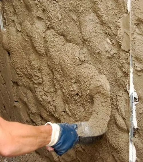 Bagaimana untuk plaster dinding dengan mortar simen?