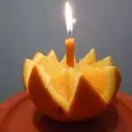 Bagaimana cara menggunakan jeruk dalam desain apartemen untuk tahun baru?