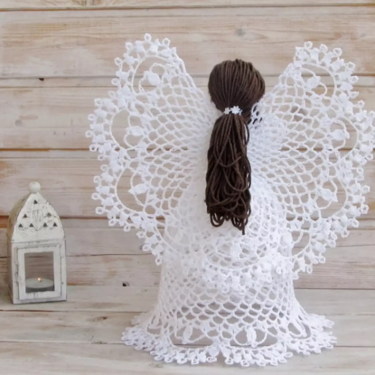 最も美しい透かしの天使たちはかぎ針編みをしています