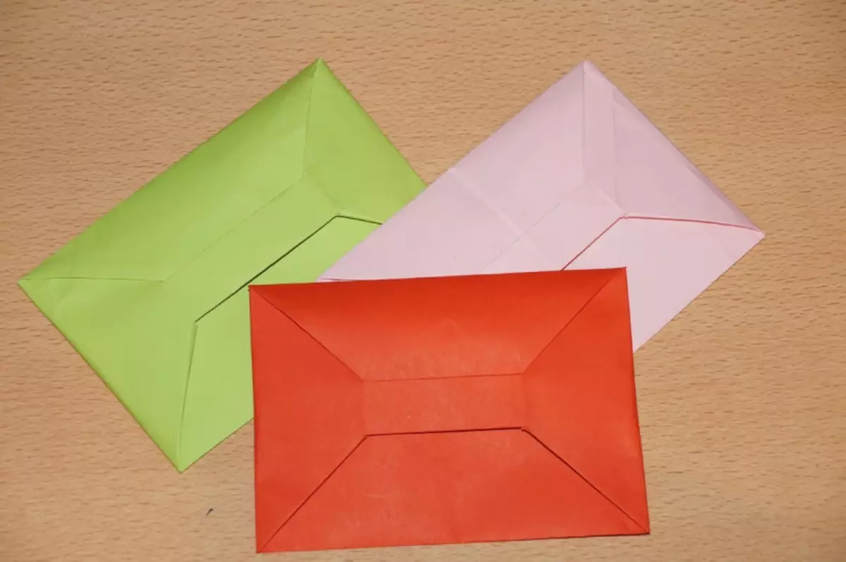 حیرت کے ساتھ پیسے کے لئے اوریگامی لفافے: سکیم، ویڈیو کے ساتھ کیسے بنائیں