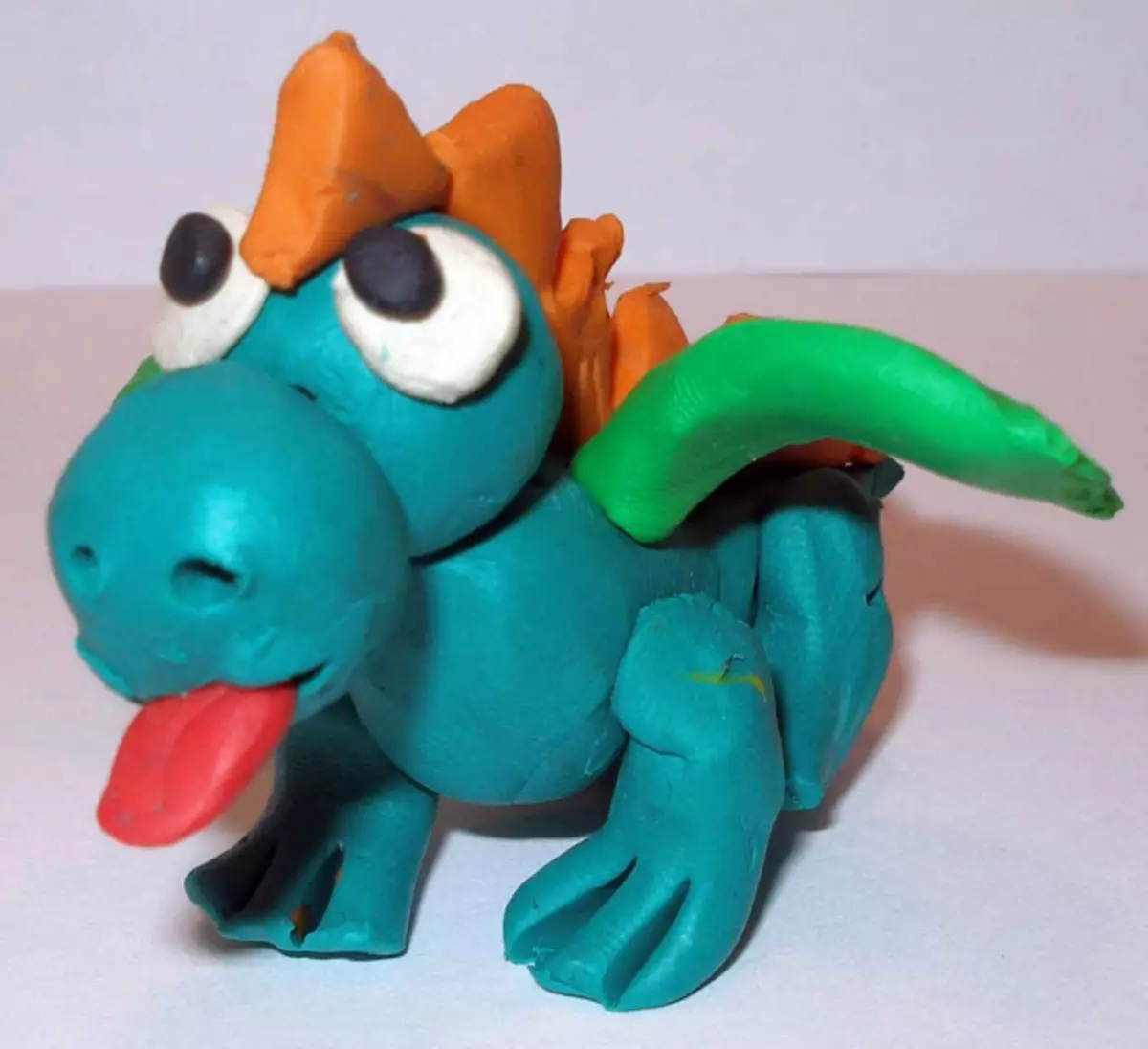 Como facer un dragón de plastilina: instrución con fotos e vídeos