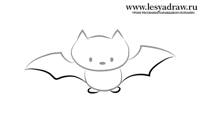 Bat papírt a kezével a halloween sablonokkal