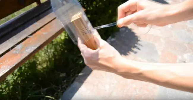 Simple homemade fixture for cutting ribbons from plastic bottles