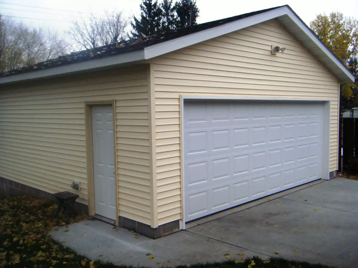 Hvordan man isolerer en garage på sommerhuset om vinteren?