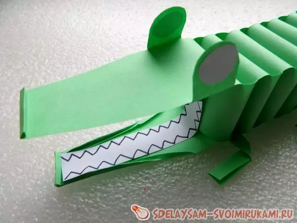 Manfaritaĵo de papera krokodilo: origami-skemo por infanoj
