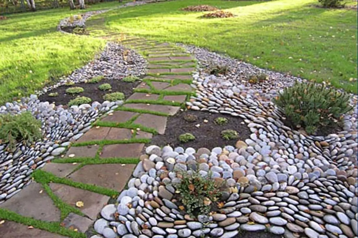 Pistas de xardín de pedra: de formigón, ladrillo, pedras, grava, azulexos e non só (40 fotos)