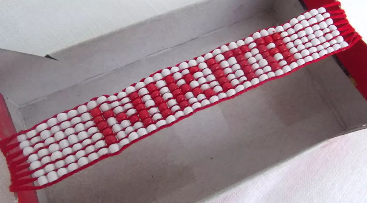 Hur man gör ett armband från pärlor med händerna från en fiskelinje och pärlor med ett videomaterial
