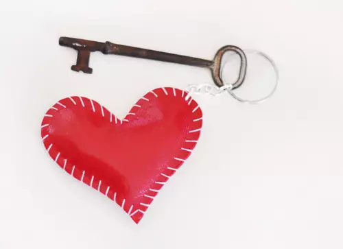 Heart keychain with their own hands