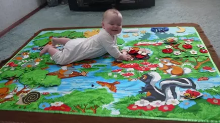 Een ontwikkelend tapijt maken voor kind doe het zelf